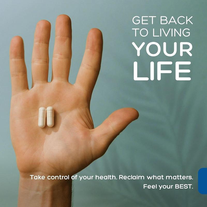 Two capsules in hand — daily immune support